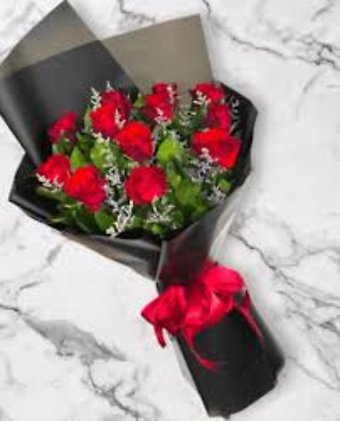 A Dozen Red Roses Beautifully Wrapped